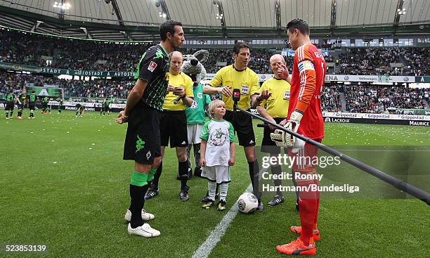 Martin Stranzl of Moenchengladbach, goalkeeper Diego Benaglio of Wolfsburg and referee Wolfgang Stark attend the Bundesliga match between VfL...