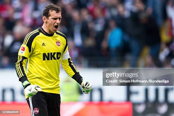 Goalkeeper Raphael Schaefer of Nuernberg celebrates his team's first goal during the Bundesliga match between Eintracht Frankfurt and 1. FC Nuernberg...