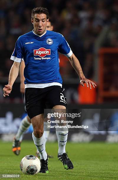 Patrick Schoenfeld of Bielefeld runs with the ball during the Second Bundesliga Playoff Second Leg match between Arminia Bielefeld and Darmstadt 98...