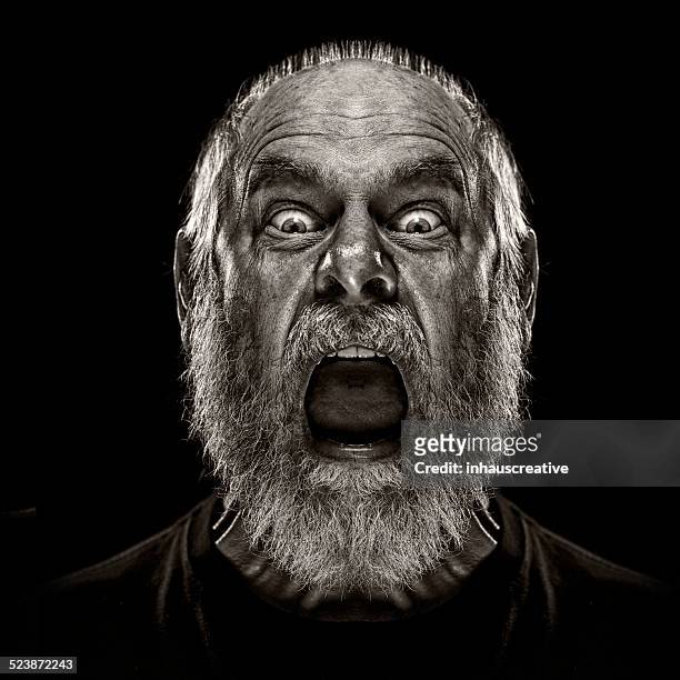 man screaming and looking terrified - screaming stock pictures, royalty-free photos & images