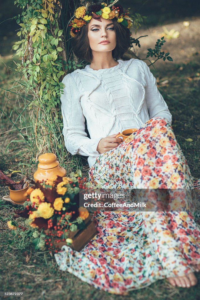 Beautiful girl with a wreath on her head