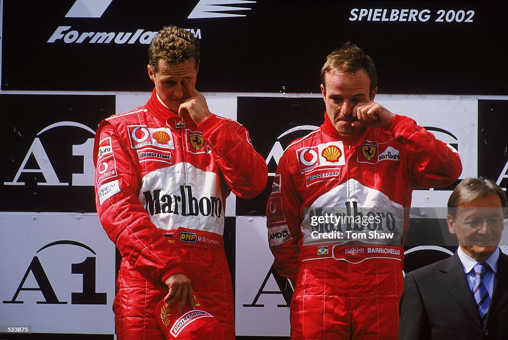 Race winner Ferrari driver Michael Schumacher of Germany and runner-up Ferrari driver Rubens Barrichello of Brazil