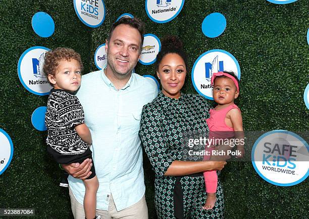 Journalist Adam Housley, Aden John Tanner Housley, actress Tamera Mowry-Housley, and Ariah Talea Housley attend Safe Kids Day at Smashbox Studios on...