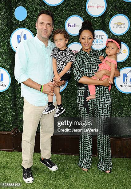 Adam Housley, Aden John Tanner Housley, Tamera Mowry and Ariah Talea Housley attend Safe Kids Day at Smashbox Studios on April 24, 2016 in Culver...