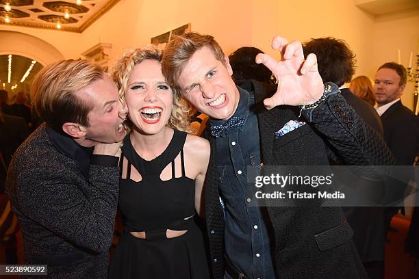 Malte Arkona with his wife Anna-Maria Arkona and Lukas Sauer attend the 'Tanz der Vampire' Musical Premiere on April 24, 2016 in Berlin, Germany.