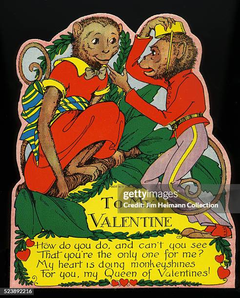 Illustration for a die-cut Valentine's Day card featuring dressed male and female monkeys in love.