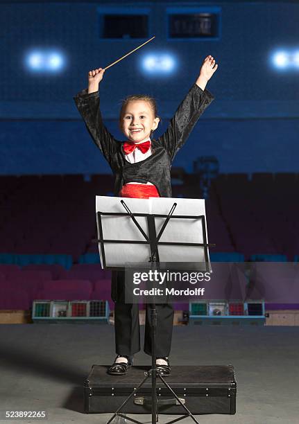 i beg your attention we begin to musical performance - conductors baton stock pictures, royalty-free photos & images