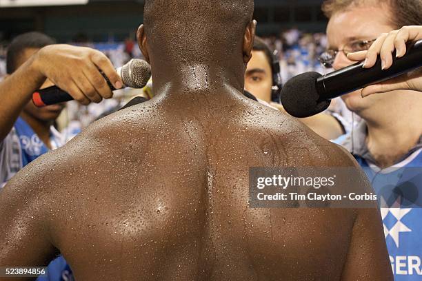 Radio commentators interview players at half time during the Botafogo V Vasco, Futebol Brasileirao League match at Estadio Ol��mpico Joao Havelange,...