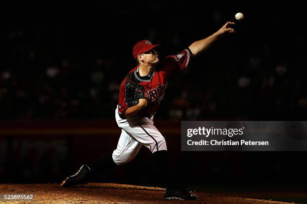 Relief pitcher Andrew Chafin of the Arizona Diamondbacks pitches against the Pittsburgh Pirates during the ninth inning of the MLB game at Chase...