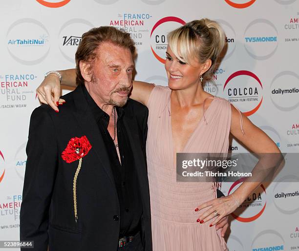 Johnny Hallyday and his wife Laeticia Hallyday attend opening night of the 20th annual COLCOA French Film Festival at Directors Guild of America on...