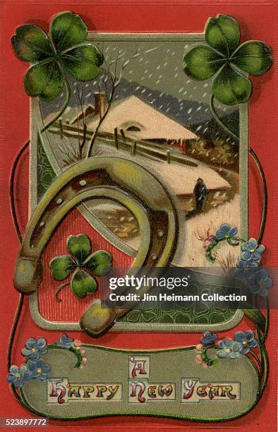 Illustration for 1909 New Year postcard featuring horse shoe, four leaf clover and man walking on road in falling snow.