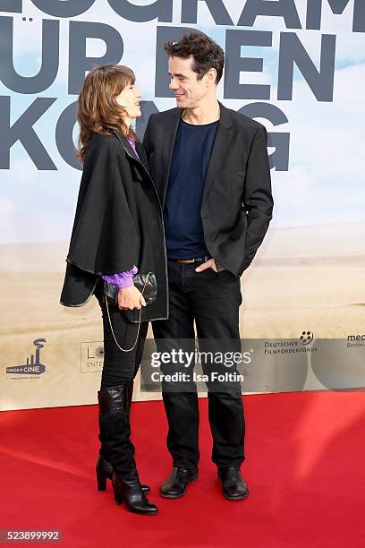 Marie Steinmann and producer Tom Tykwer attend the German premiere for the film 'A Hologram for the King' at Zoopalast on April 24, 2016 in Berlin,...