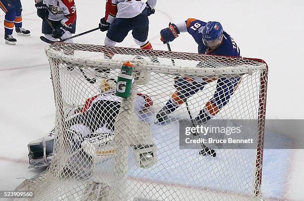 John Tavares of the New York Islanders scores the game tying goal at 19:06 of the third period against Roberto Luongo of the Florida Panthers in Game...