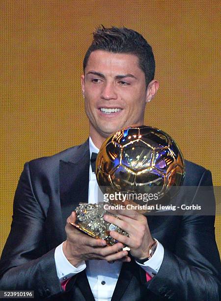 Ballon d'Or winner Cristiano Ronaldo of Portugal and Real Madrid looks on with son Cristiano Ronaldo Junior during the FIFA Ballon d'Or Gala 2013 at...