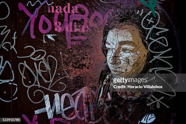 Graffiti covered door in El Raval, Ciutat Vella district of Barcelona, Catalonia, Spain, 25 January 2014. The neighborhood, also known as...