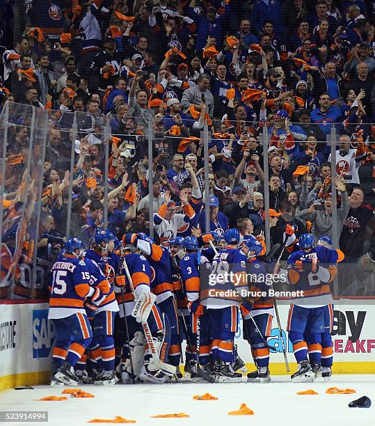 The New York Islanders celebrate a 2-1 victory over the Florida Panthers in Game Six of the Eastern Conference First Round during the 2016 NHL...