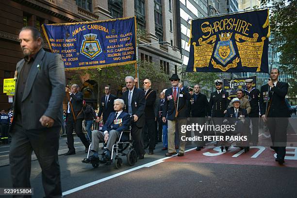 War veterans take part in the ANZAC parade to mark the centenary of the Gallipoli landings in Sydney on April 25, 2016 Thousands attended moving dawn...