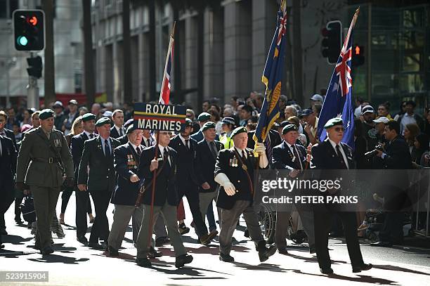 War veterans take part in the ANZAC parade to mark the centenary of the Gallipoli landings in Sydney on April 25, 2016 Thousands attended moving dawn...