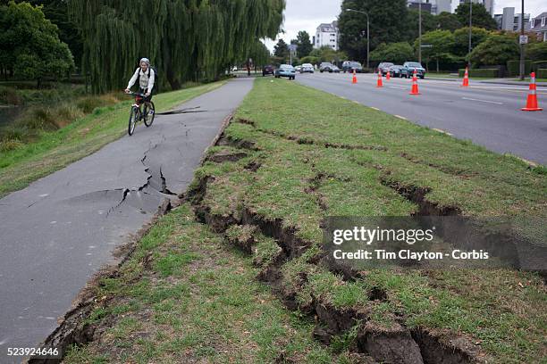 Cracks in a grass verge and cycle path in Christchurch after a Powerful earth quake ripped through Christchurch, New Zealand on Tuesday lunch time...