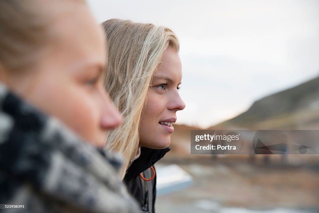 Thoughtful female hiker with friend