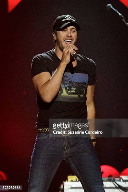 Luke Bryan performs onstage during iHeartRadio Country Festival in Austin at the Frank Erwin Center on March 29, 2014 in Austin, Texas.
