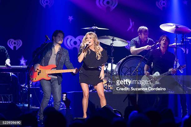 Carrie Underwood performs onstage during the iHeartRadio Country Festival at the Frank Erwin Center on March 29, 2014 in Austin, Texas.