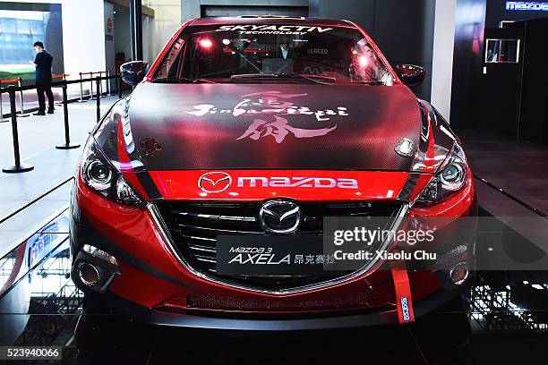 Mazda3 Axela 5HB CTCC is displayed during the Beijing Motor Show - Auto China on April 25, 2016 in Beijing, China. Mazda Motor Co unveiled the Mazda...