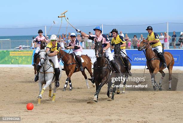 Polo on Sandbanks beach during the 2010 British Beach Polo Championships in Sandbanks, near Poole in Dorset, UK. | Location: Pool, England, United...