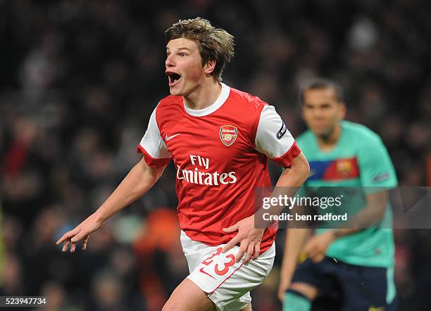 Andrey Arshavin of Arsenal celebrates scoring the winning goal during the UEFA Champions League Round of Sixteen, 1st Leg match between Arsenal and...