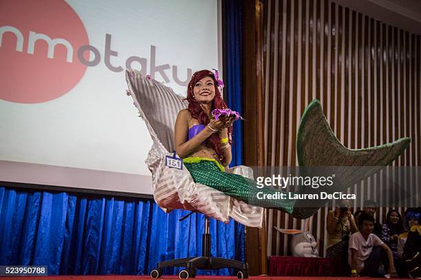 One cosplayer dressed as Ariel from Disney's "The Little Mermaid" on April 24, 2016 in Yangon, Burma. Hundreds of youths between 16 to 24 gathered at...