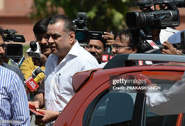 Indian television journalists question Bhartiya Janta Party MP Paresh Rawal as he arrives in a even-digit car during the begining of the second part...