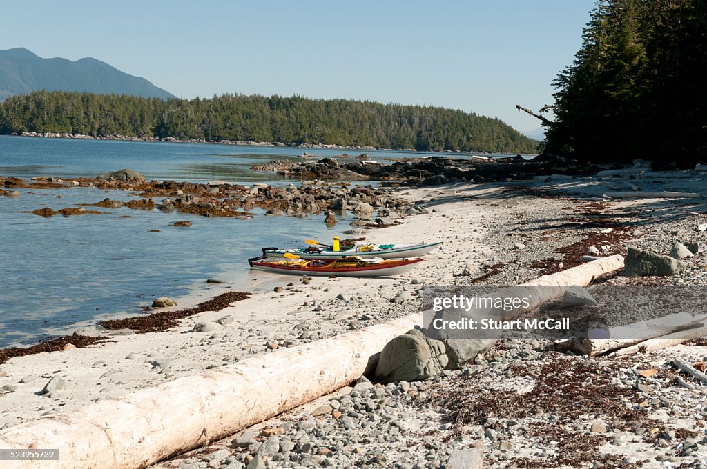 Sea kayaks on west coast beach