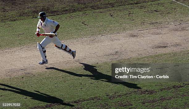 Australian batsman Matthew Hayden batting during the start of the second innings on a cracked pitch late in the day during day three of the third...