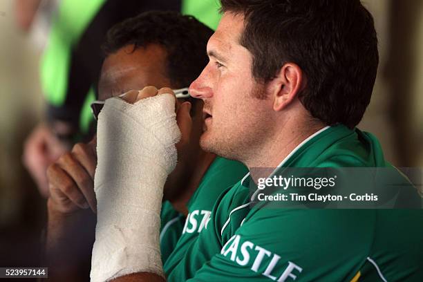 Injured South African Captain Graeme Smith sits in the stands during day four of the third test match between Australia and South Africa at the...