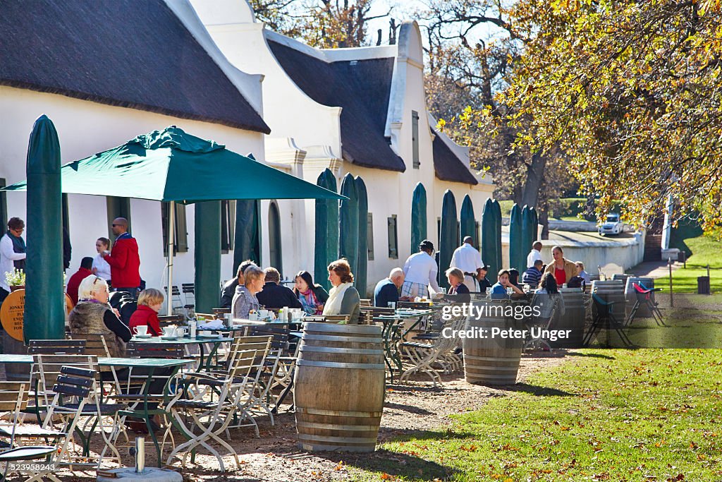 People having coffee at a winery cafe