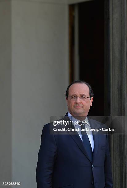 French President Francois Hollande, left, welcomes interim Central African Republic President Catherine Samba-Panza, as they pose for photographers...