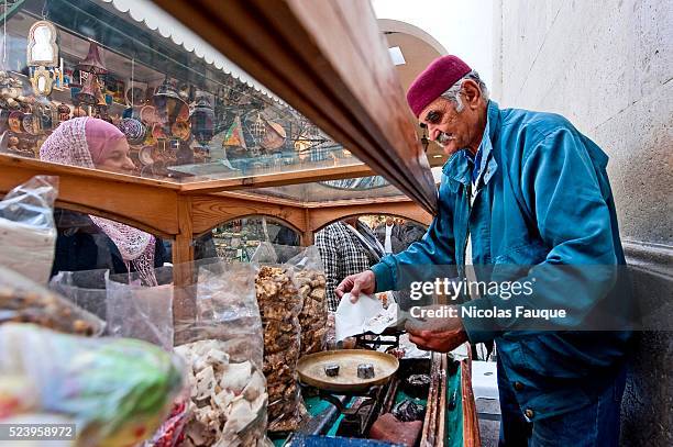 Itinerant salesman of cakes in the streets of the souk of the medina of Tunis