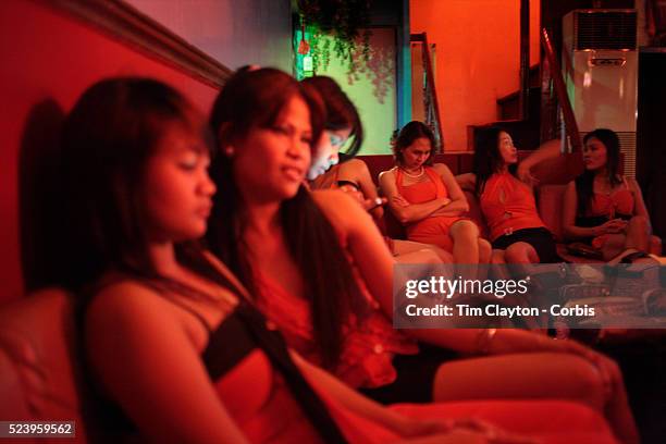 Young prostitutes at a karaoke bar on October 10, 2008 in Adriatico Street, Malate, Manila.