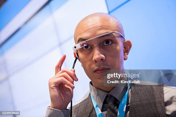 Attendee tries out Salesforce apps on Google Glass at the annual Salesforce Dreamforce 2013 conference in San Francisco, California.