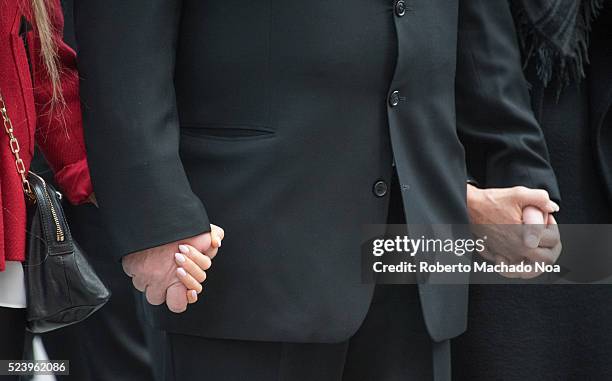 Doug Ford hands holding Krita's and Karla's during Rob Ford funeral. The procession walked from the City Hall to the St. James Cathedral where the...