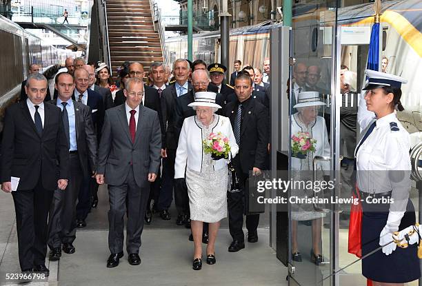 The Queen Elizabeth II and HRH The Duke of Edinburgh arrive at Gare du Nord to attend the official ceremonies on the occasion of the 70th Anniversary...