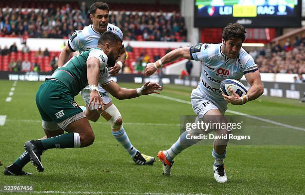 Maxime Machenaud of Racing 92 breaks for the try line during the European Rugby Champions Cup semi final match between Leicester Tigers and Racing 92...