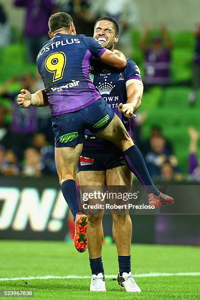 Jesse Bromwich of the Storm celebrates a try with team-mate Cameron Smith of the Storm during the round eight NRL match between the Melbourne Storm...