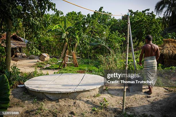 Betal Para, Bangladesh The dung pit of a biogas plant is located on a farm in a rural area in the southwest of Bangladesh on April 10, 2016 in Betal...