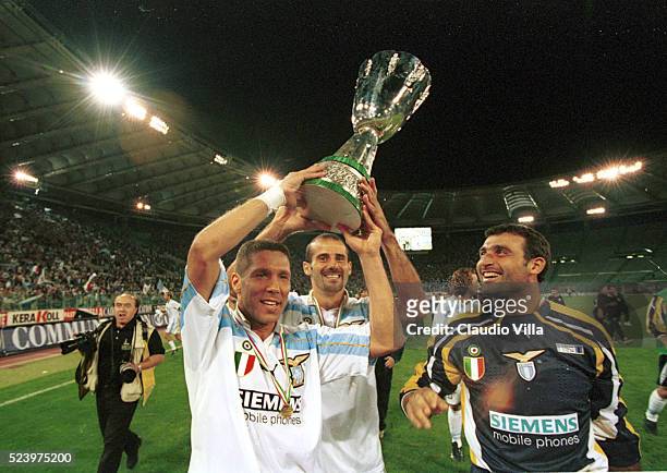 Diego Pablo Simeone, Giuseppe Pancaro and Angelo Peruzzi celebrate at the end of the Italian Supercup match between FC Inter Milan and SS Lazio, Rome.