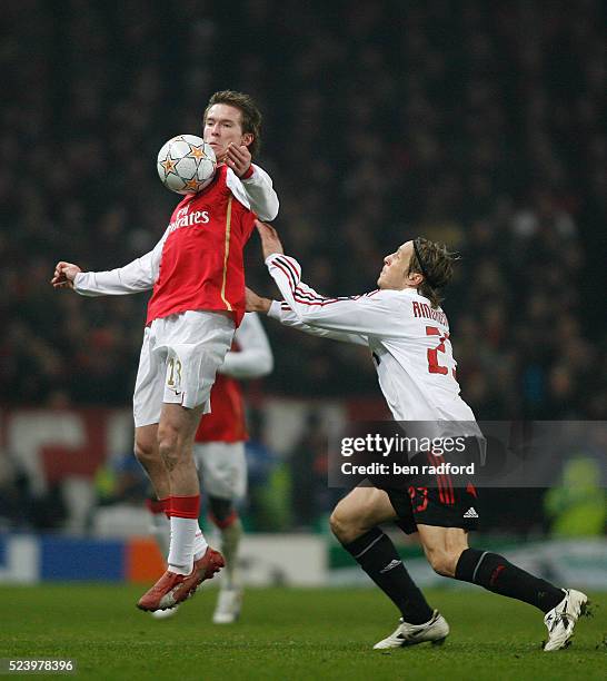 Alexander Hleb of Arsenal and Masimo Ambrosini of AC Milan during the Champions League First Knock Out Round between Arsenal and AC Milan at the...