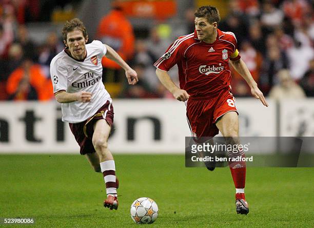 Steven Gerrard of Liverpool and Alexsandr Hleb of Arsenal during the UEFA Champions League Quarter-Final 2nd leg match between Liverpool and Arsenal...