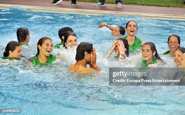 Rafa Nadal celebrates his win on the swimming pool after defeating Kei Nishikori of Japan in their final match during the Barcelona Open Banc...