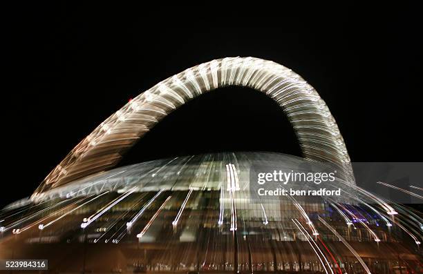 Floodlit Wembley Stadium after dark during the international friendly match between England and USA at Wembley Stadium, London, UK.