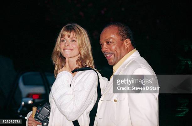 Natassja Kinski and partner Quincy Jones attend the wedding of Whoopi Goldberg and Lyle Trachtenberg.
